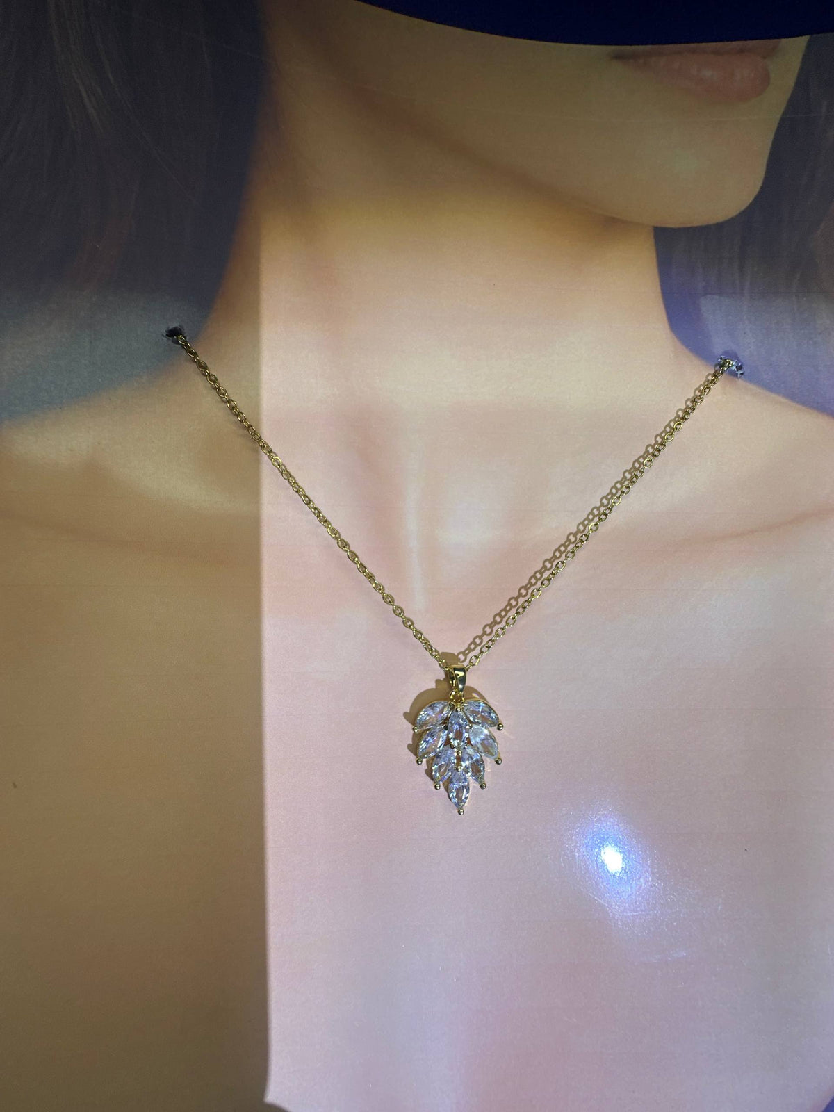 Celestial Crystal Leaf Pendant Necklace – Gold-Tone Statement Necklace